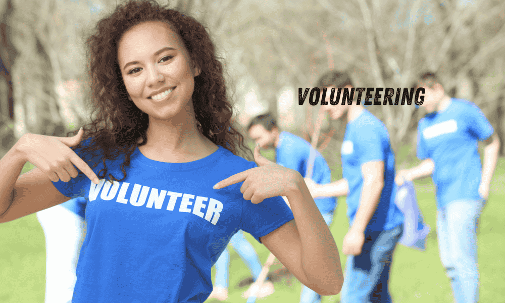 A young woman volunteering in her community, engaging in meaningful activities and hobbies for women in their 20s.