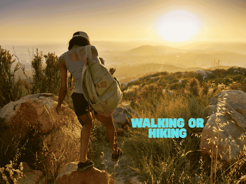 a girl hiking on mountain trail