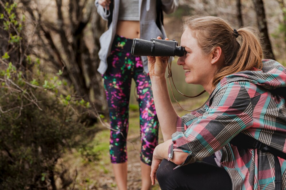 "Birdwatching – a great hobby for women to connect with nature, relax outdoors, and observe beautiful bird species in their natural habitats."