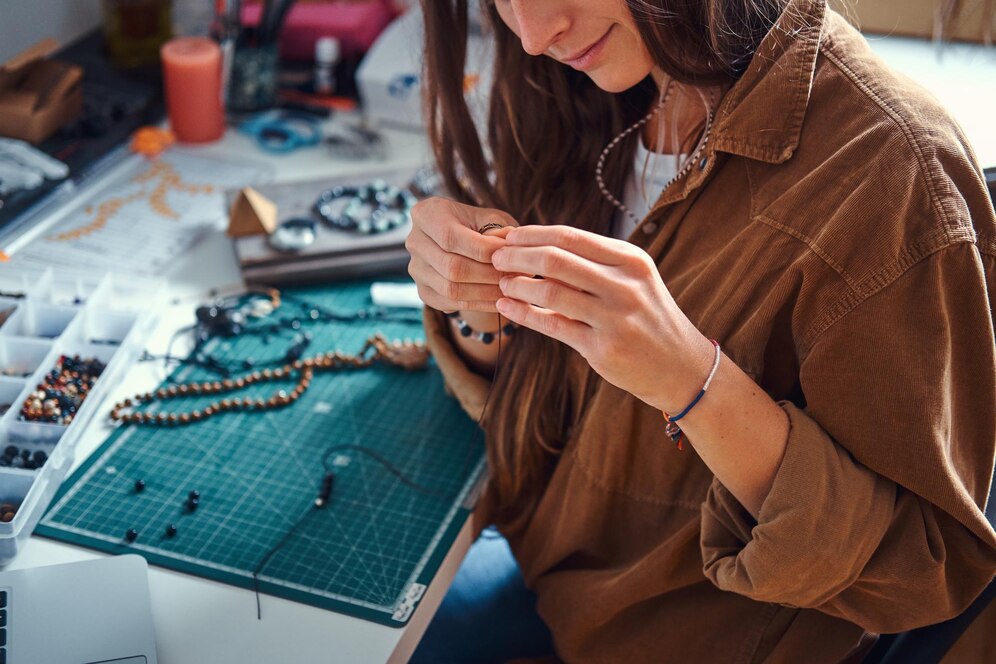 "Crafting jewelry pieces – a great hobby for women to express creativity, design unique accessories, and enjoy a relaxing artistic pastime."