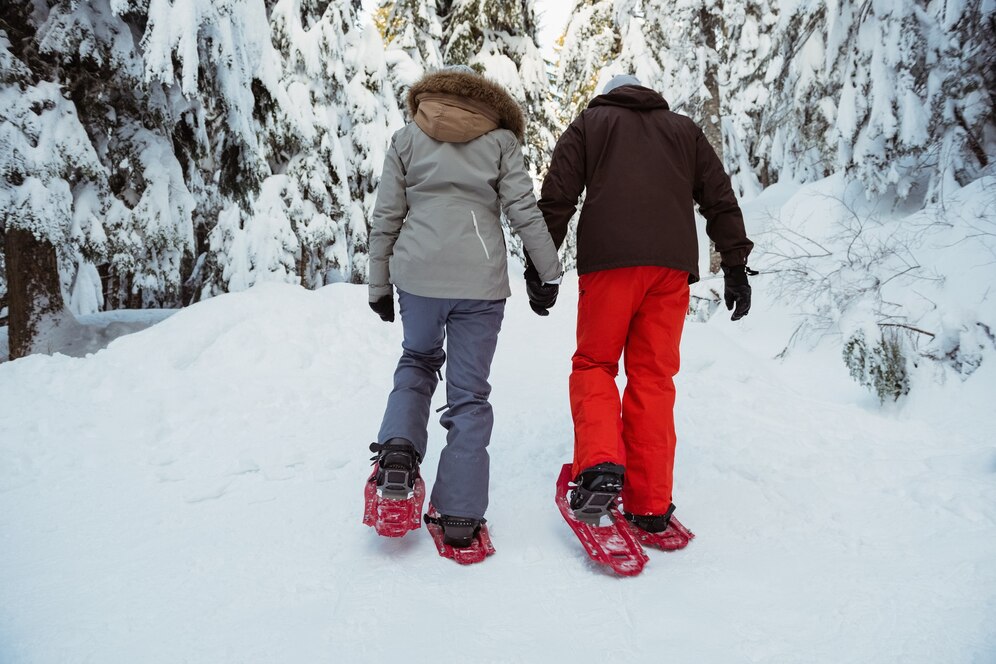 Adventurous winter hobbies for women – snowshoeing for outdoor fun and fitness in the snow.