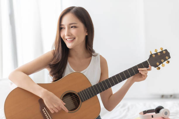 "Play a Musical Instrument (Guitar, Piano) – A creative and enriching hobby for women in their 40s"