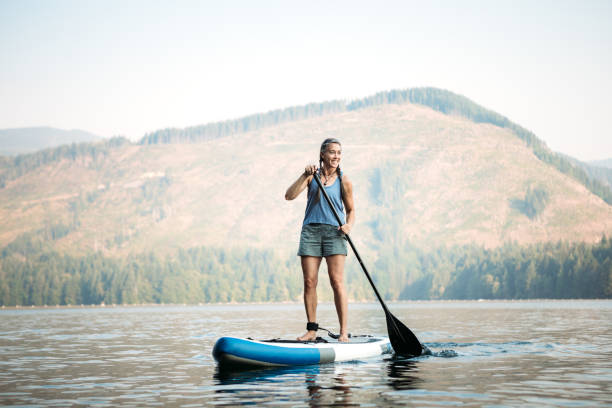 "Stand-Up Paddleboarding (SUP) – A fun and balancing water hobby for women in their 40s"