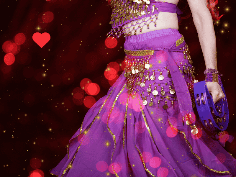 Woman performing belly dance – empowering and rhythmic fitness hobby for women