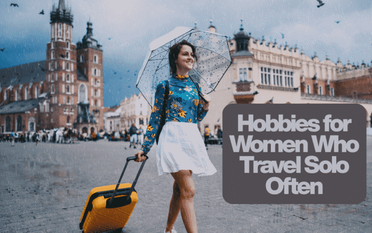 A solo female traveler smiling with a yellow suitcase and umbrella in a European city—representing hobbies for women who travel solo often.