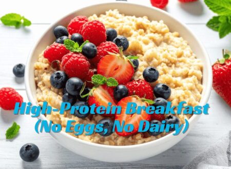 High-protein breakfast with no eggs featuring a bowl of granola, yogurt, and fresh berries on a bright morning table.