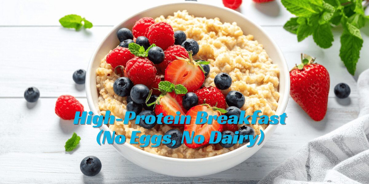 High-protein breakfast with no eggs featuring a bowl of granola, yogurt, and fresh berries on a bright morning table.