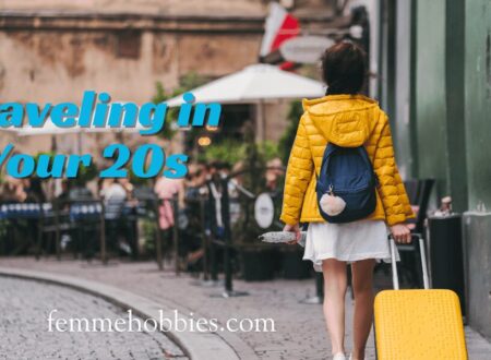 Young woman with a yellow suitcase walking through a European street, symbolizing the freedom and adventure of traveling in your 20s.