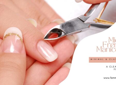 Close-up of a Micro French Manicure with minimal white tips and gold detailing during a professional nail treatment.